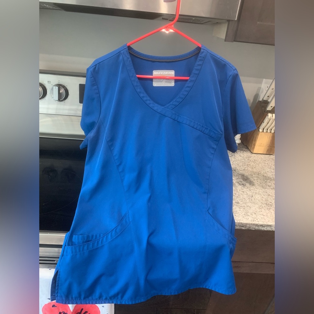 Sketchers women’s royal blue scrub top